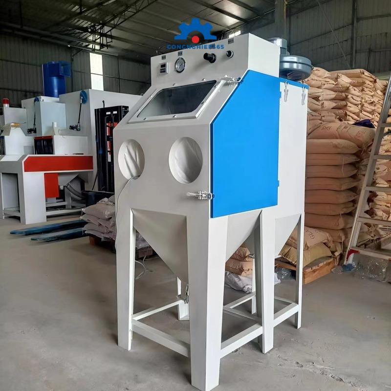 giá máy phun cát làm sạch bề mặt kim loại